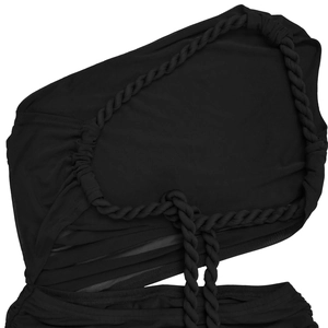 Detail of sexy black dress showing cutout waist with thick woven rope and ruched fabric
