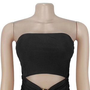 Close-up of black strapless crop top with stretch fabric and waist cutout detail
