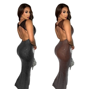 Close-up of black and dark brown backless dresses with rhinestones and mesh details