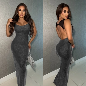 Detail of sexy mesh backless dress with silver rhinestones and cross straps