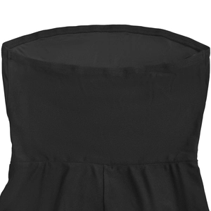 Detailed macro view of black strapless jumpsuit elastic fabric with high-quality stitching