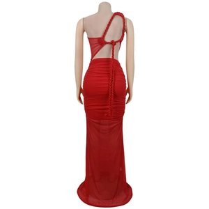 Detail of red mesh evening dress featuring open back design and thick braided rope straps