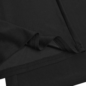 Detailed macro view of black stretch fabric texture and professional twin needle hem stitching