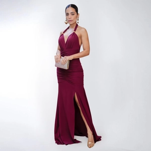 Elegant burgundy high slit evening dress featuring a deep V-neck and ruched details