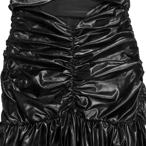 Detail of black metallic shiny dress featuring central ruched gathering and high-gloss fabric