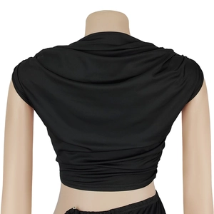 Rear view detail of black sleeveless cowl neck crop top in soft draped knit fabric