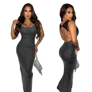 Detail of elegant black mesh backless dress with shimmering silver rhinestones and straps