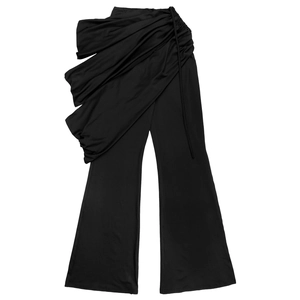 Detail of high waist black flared trousers featuring an asymmetric draped fold design