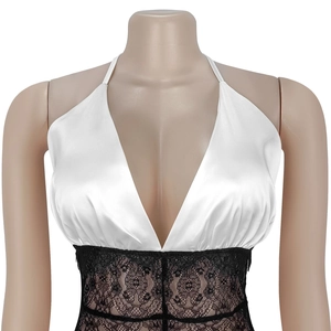 Close-up of white satin V-neck top with black floral lace stitching detail