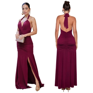 Detail of burgundy halter maxi dress featuring deep V-neck, ruched texture, and high slit