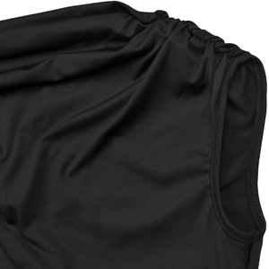 Detailed macro shot of black knit fabric showing ruching technique on shoulder seam