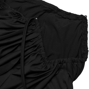 Detail of black ribbed fabric featuring side drawstring ruched design and silver metal beads