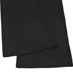 Detailed view of black trousers with high-quality double-stitch hem and elastic fabric texture