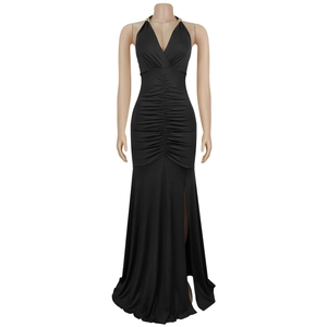 Detail of elegant black halter dress featuring a deep V-neck and stylish high side slit
