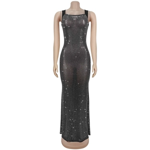 Close-up of sparkling silver rhinestones on a mesh black bodycon dress for women
