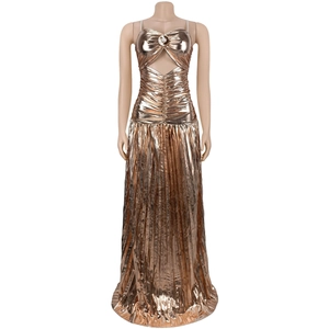 Detail of rose gold metallic maxi dress with halter neckline and front cutout design