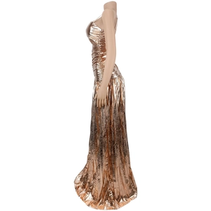 Detailed side view of metallic rose gold evening gown with pleated texture and shimmer