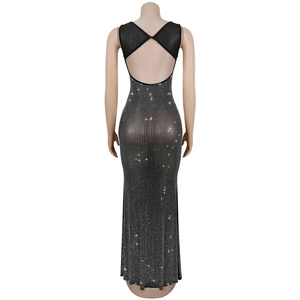 Detailed back view of a black mesh evening dress featuring sparkling rhinestones and open back