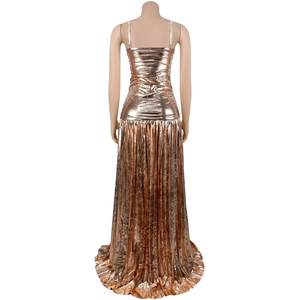 Detail of rose gold metallic maxi dress featuring thin straps and pleated shimmering fabric