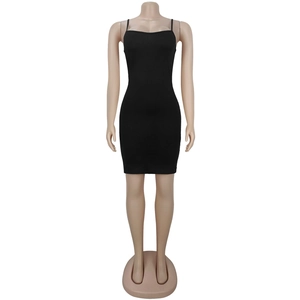 Close-up of black tight mesh dress with fine straps and elegant rhinestone patterns