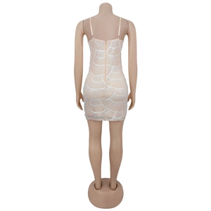 Detail of sequin pattern and back invisible zipper on this beige mini slip dress