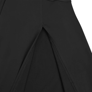 Detailed close-up of a high slit design on an elegant black V-neck dress