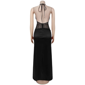 Detailed view of backless black satin dress featuring intricate lace patchwork details