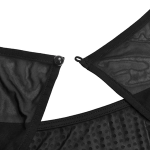 Close-up of the delicate black mesh dress featuring a small spherical button and elastic loop