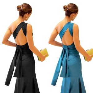 Detail of elegant backless one-shoulder fishtail dress with decorative back ribbon tie