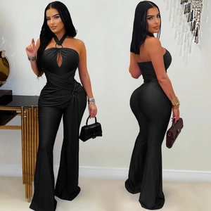 Front and back view of a chic black halter neck wide-leg jumpsuit with cutout details