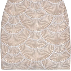 Detailed close-up of intricate pearl and sequin embroidery on apricot mesh dress fabric