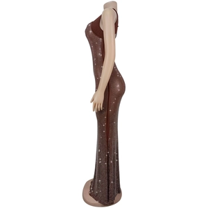 Detail of a brown bodycon dress featuring shimmering rhinestones and mesh fabric textures