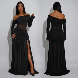 Detail of elegant black off-shoulder maxi dress with sheer mesh waist and high side slit