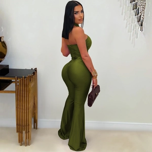 Detail of olive green halter neck jumpsuit with backless design and wide leg flared trousers
