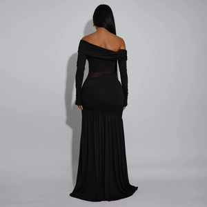 Back view of black off-shoulder evening dress with sheer mesh panel and pleated skirt