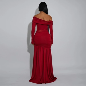 Detailed view of backless red dress with elegant ruching and long slit hemline