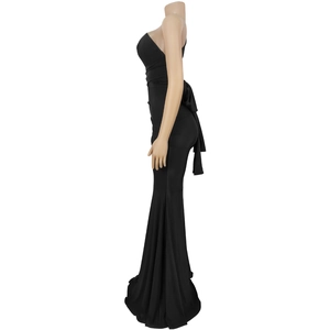 Detail of elegant black fishtail dress with strapless design and ribbon back decoration