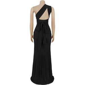 Detail view of one-shoulder backless evening gown featuring a large elegant bow decoration