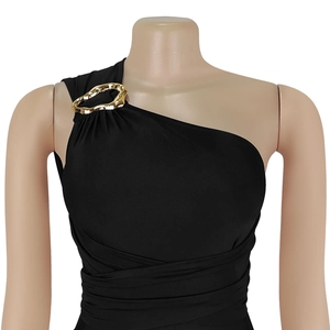 Detail of elegant black one-shoulder dress featuring a gold buckle and ruched waist