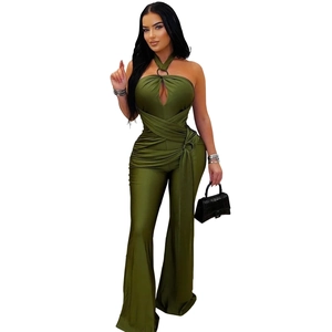 Detail of olive green halter jumpsuit with cutout neckline and wide leg cut
