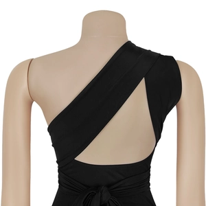 Detail of elegant black one-shoulder dress featuring an open back with lace-up ties