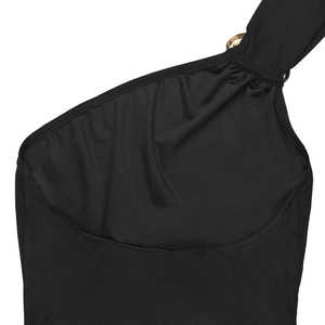 Close-up of black one-shoulder dress with a polished gold metal ring shoulder detail