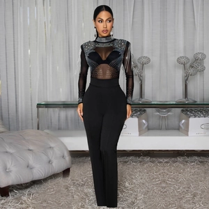 Sexy black mesh jumpsuit with silver rhinestones and fringe details for women