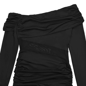 Detail of black off-shoulder dress featuring pleated texture and mesh patchwork design