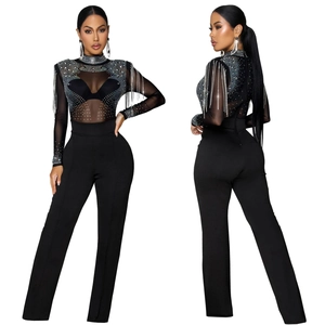 Women black sheer mesh jumpsuit with silver rhinestones and long fringe sleeves