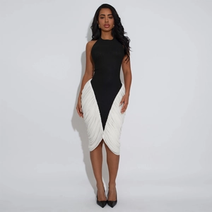 Chic halter neck bodycon dress featuring black and white contrast side ruched details