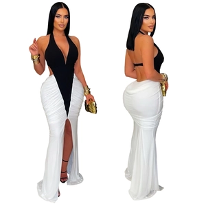 Elegant black V-neck halter top paired with a white side slit pleated maxi dress for women