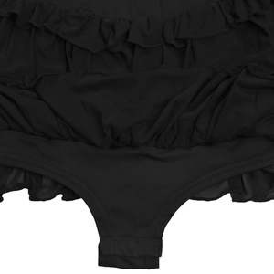 Detailed macro view of black mesh ruffles and layered fabric on a women's bodysuit