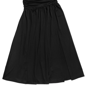 Detail showing gathered waist design and high-density black draped fabric of the dress