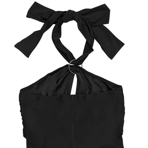 Detail of black halter neckline with large bow tie and metal ring hollow-out design